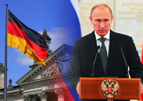 Флаг Германии и Владимир Путин