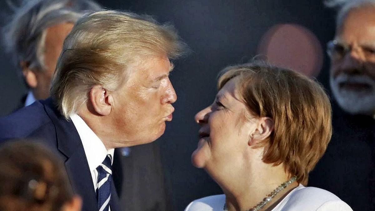Меркель призвала Европу задуматься о мире без лидерства США Меркель и Трамп